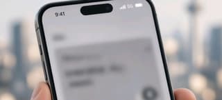 Smartphone displaying a mobile network signal indicator switching between 5G and 4G/LTE