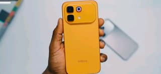 Five Infinix 5G smartphones lined up against a plain background
