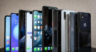 A lineup of modern smartphones looking nearly identical year to year