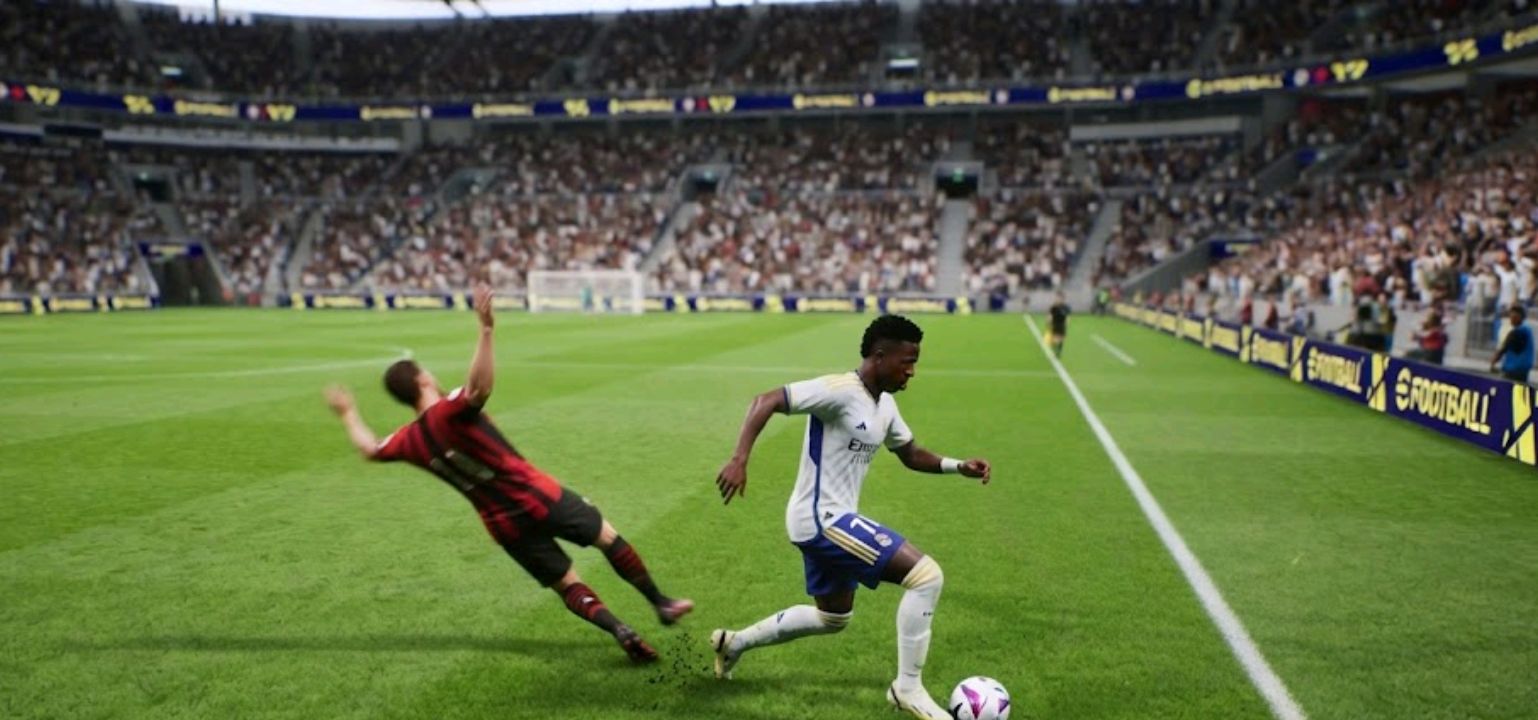 Winger dribbling past a defender near the touchline
