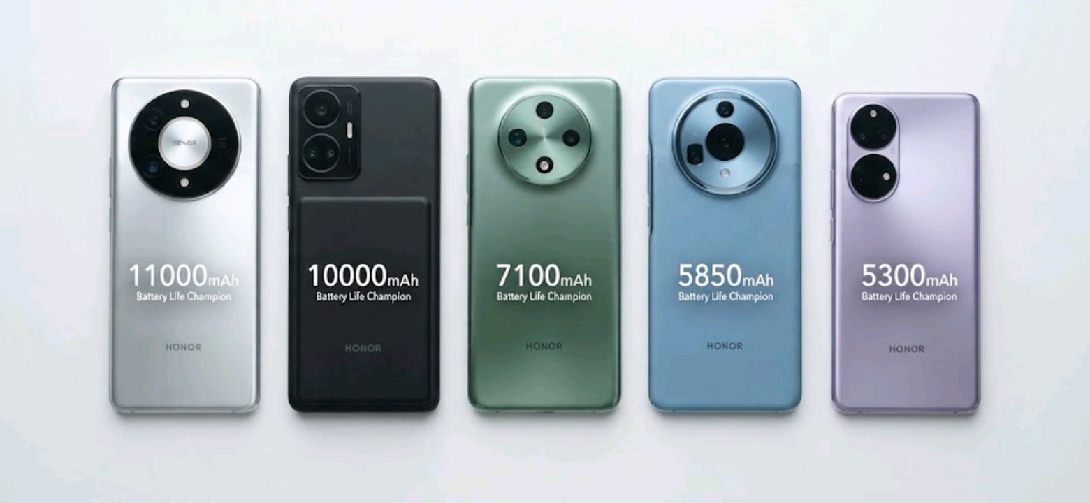 Five Honor smartphones with large batteries laid out side by side