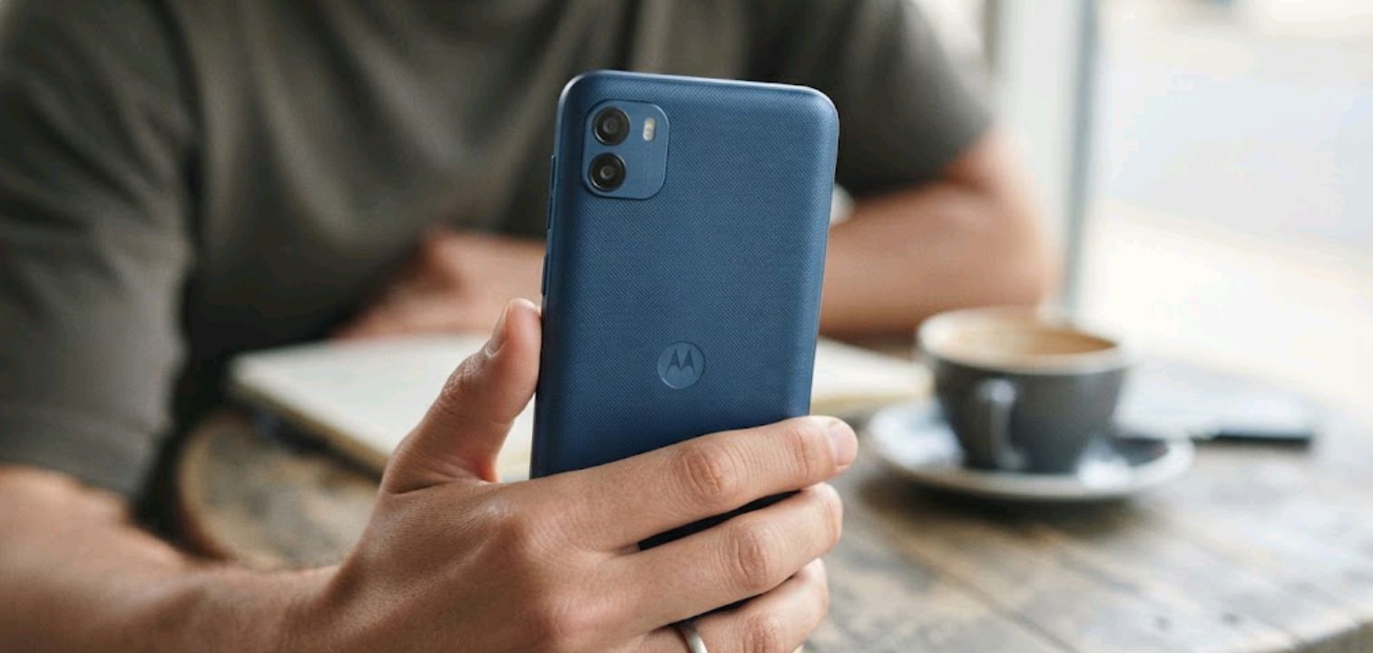 Moto G Play (2026) in hand, back panel visible