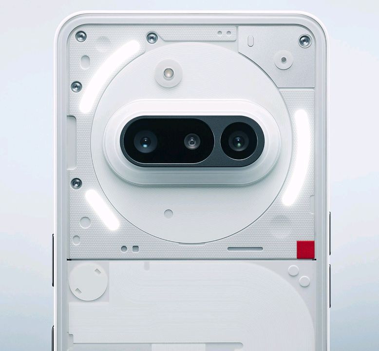 Close-up of the Nothing Phone (3) rear camera housing showing its three 50MP lenses