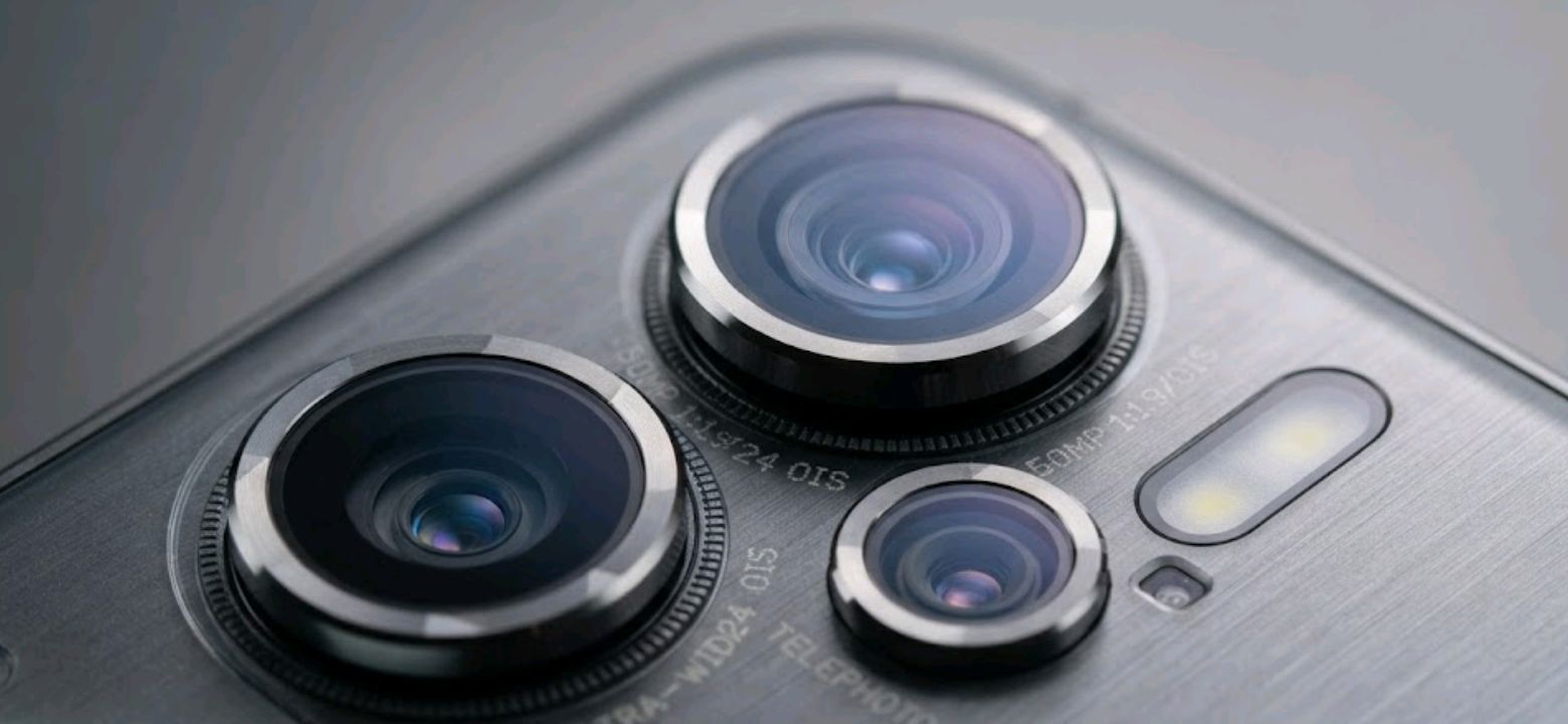 Close-up of a smartphone camera module with three lenses