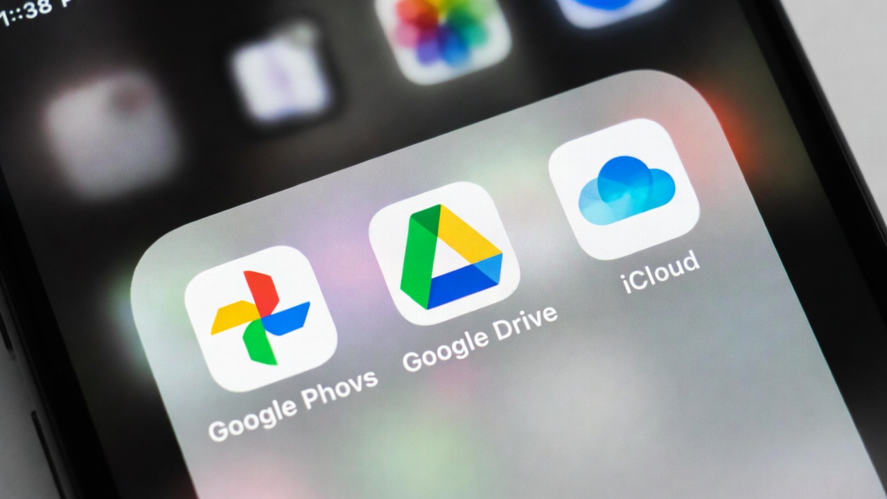 A phone screen showing Google Photos, iCloud, and OneDrive apps open side by side — illustrating how most users are already covered by cloud ecosystems they're not fully using