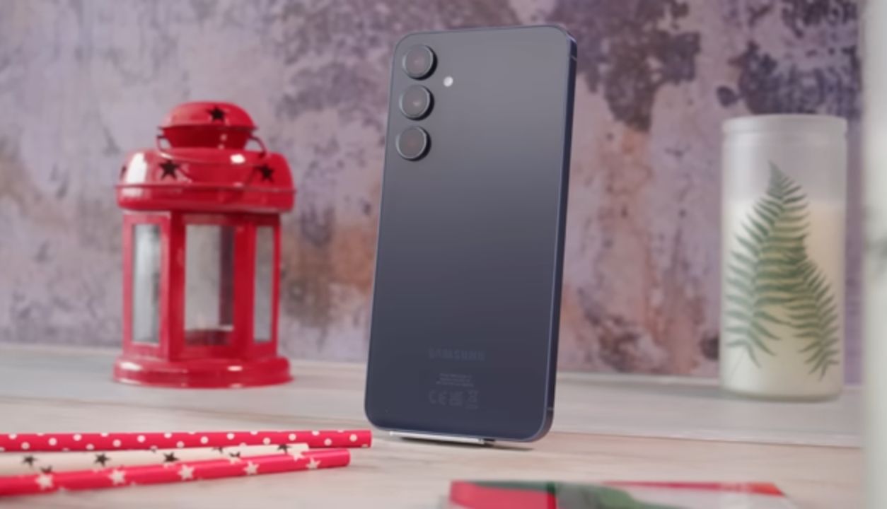 Samsung Galaxy A55 5G held outdoors showing rear camera module design