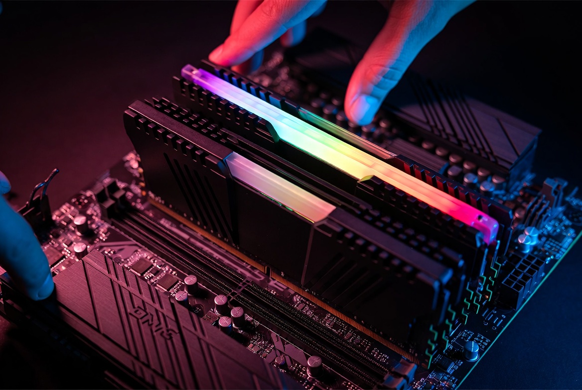DDR5 RAM sticks installed in a gaming motherboard with RGB lighting