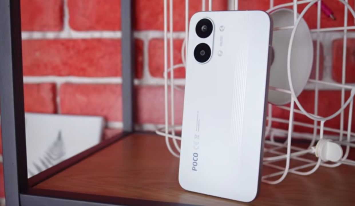 POCO X8 Pro Max held in hand showing its thicker battery-focused build