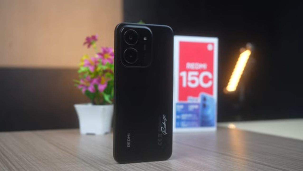 Redmi 15C held in hand showing screen size