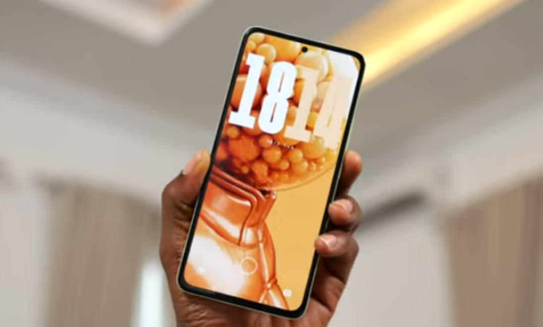 Redmi Note 14 placed on a surface in natural light — it still looks stunning, but looks are the whole point of this conversation