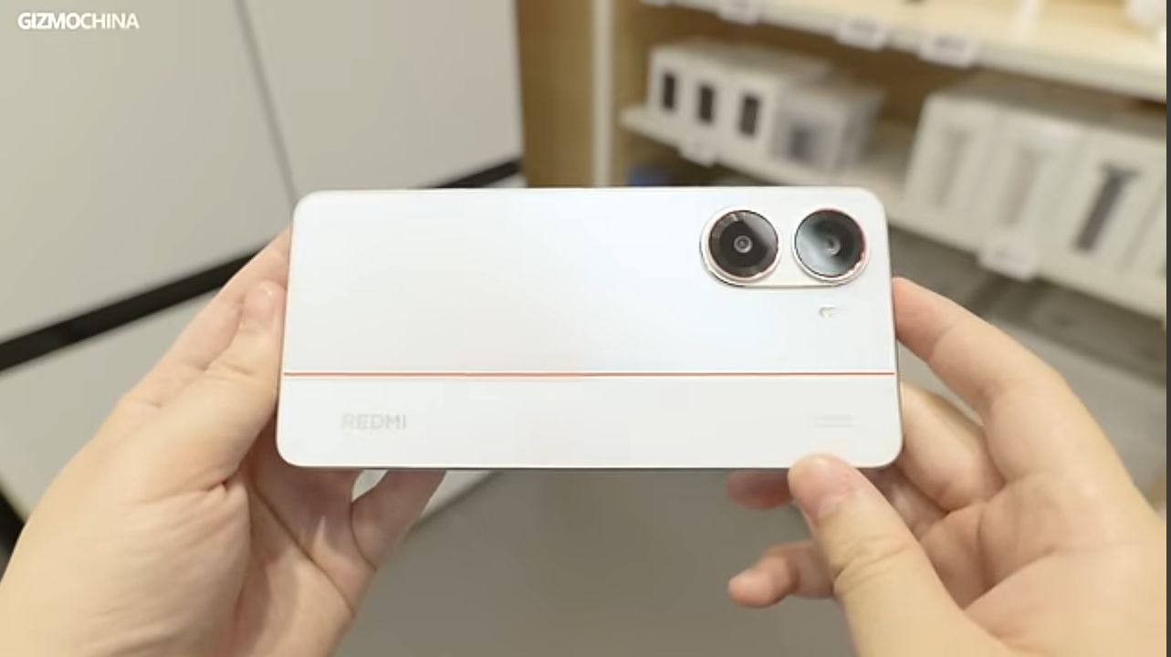 Redmi Turbo 4 in Sea Blue colorway showing the AMOLED display