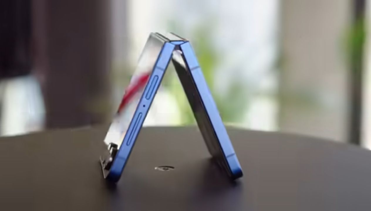 Person using the Galaxy Z Flip 7's cover screen to reply to a message without opening the phone