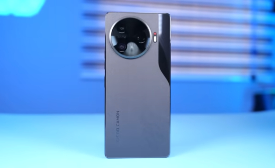 Close-up of the Action Dot glowing next to the rear camera module — taken with my own unit